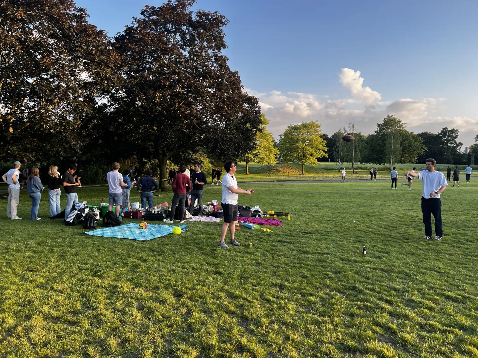 People playing outdoor games in a park