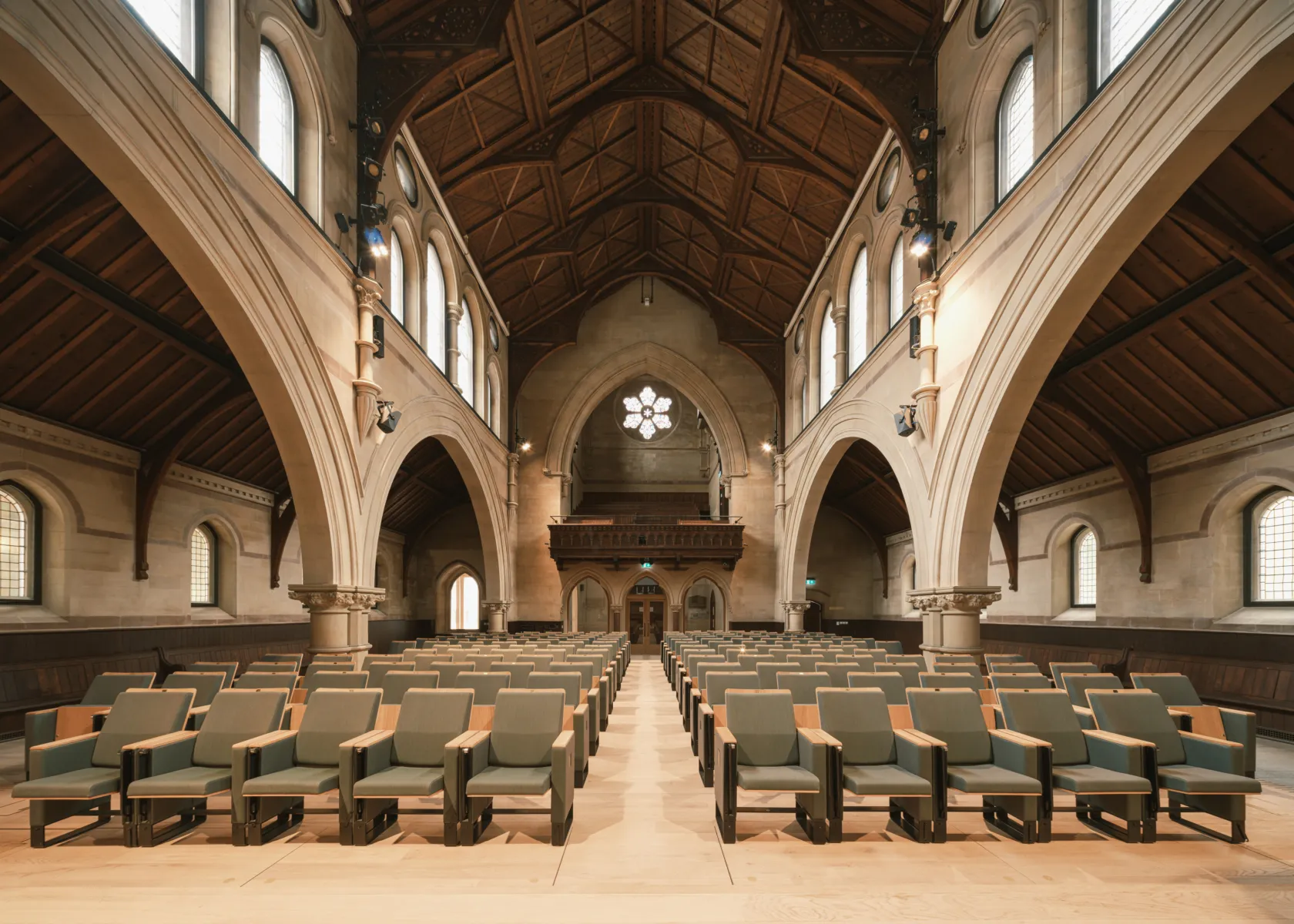 Historic hall with arches and seating