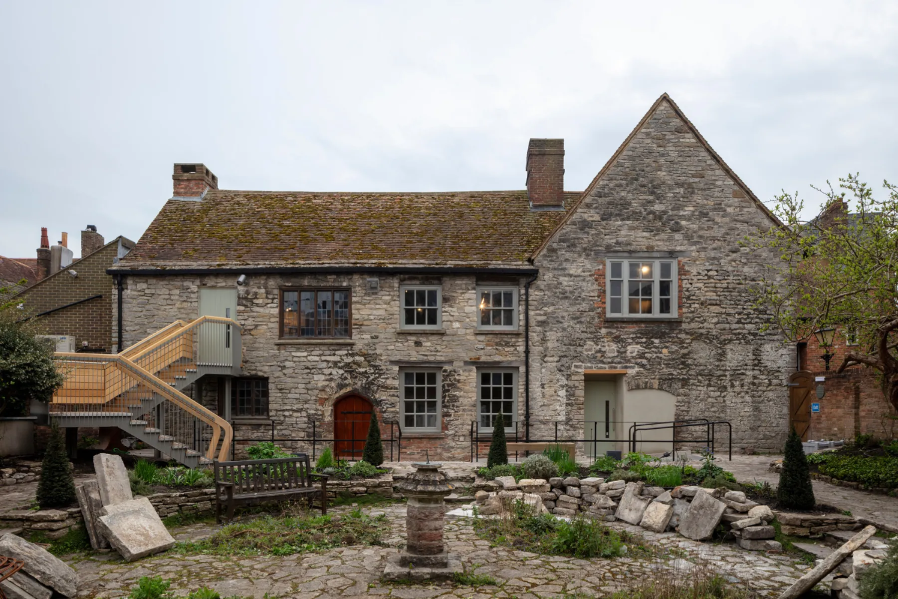 old stone house and garden
