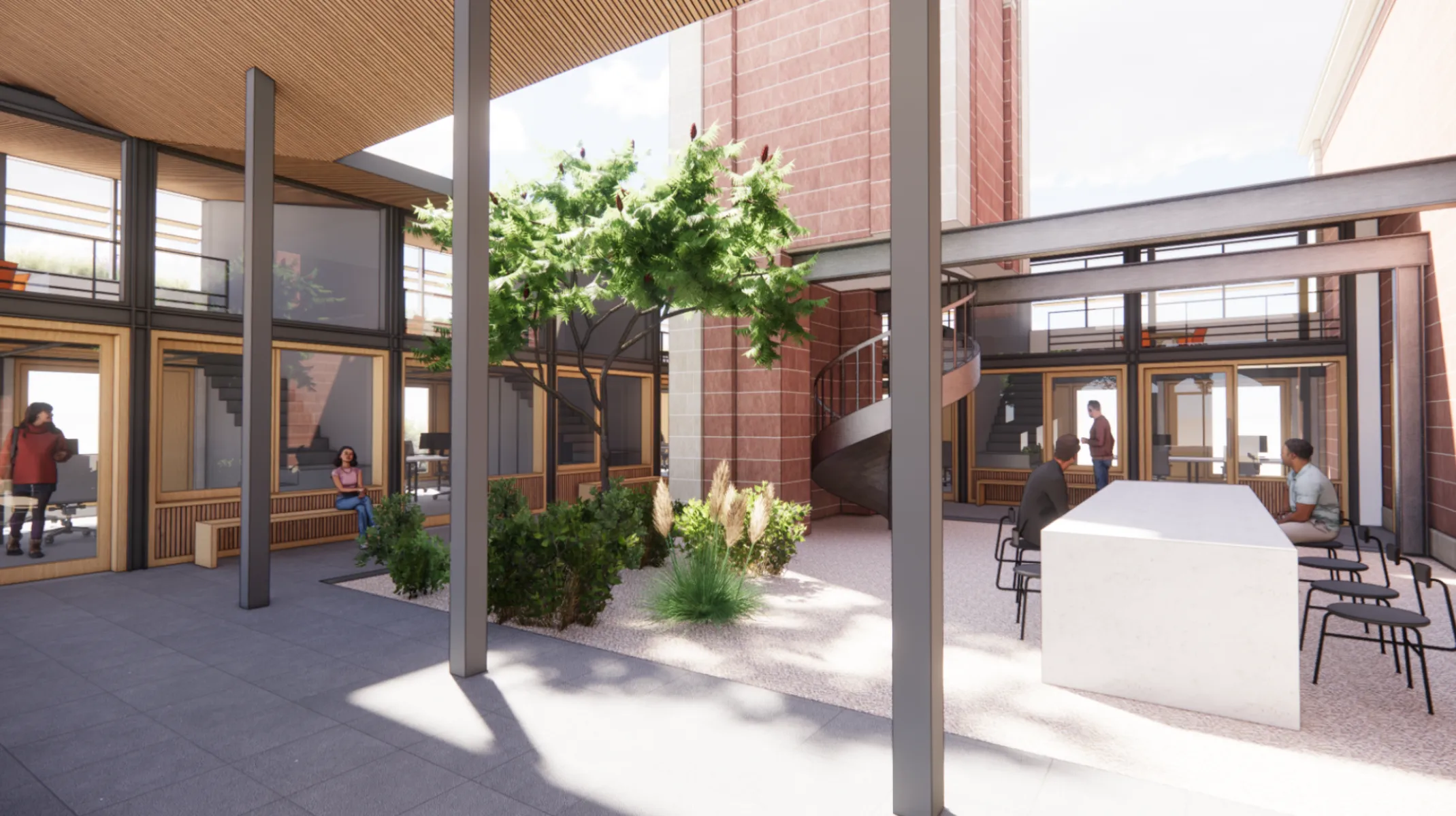 Landscaped courtyard with seating, planting and offices arranged around it.