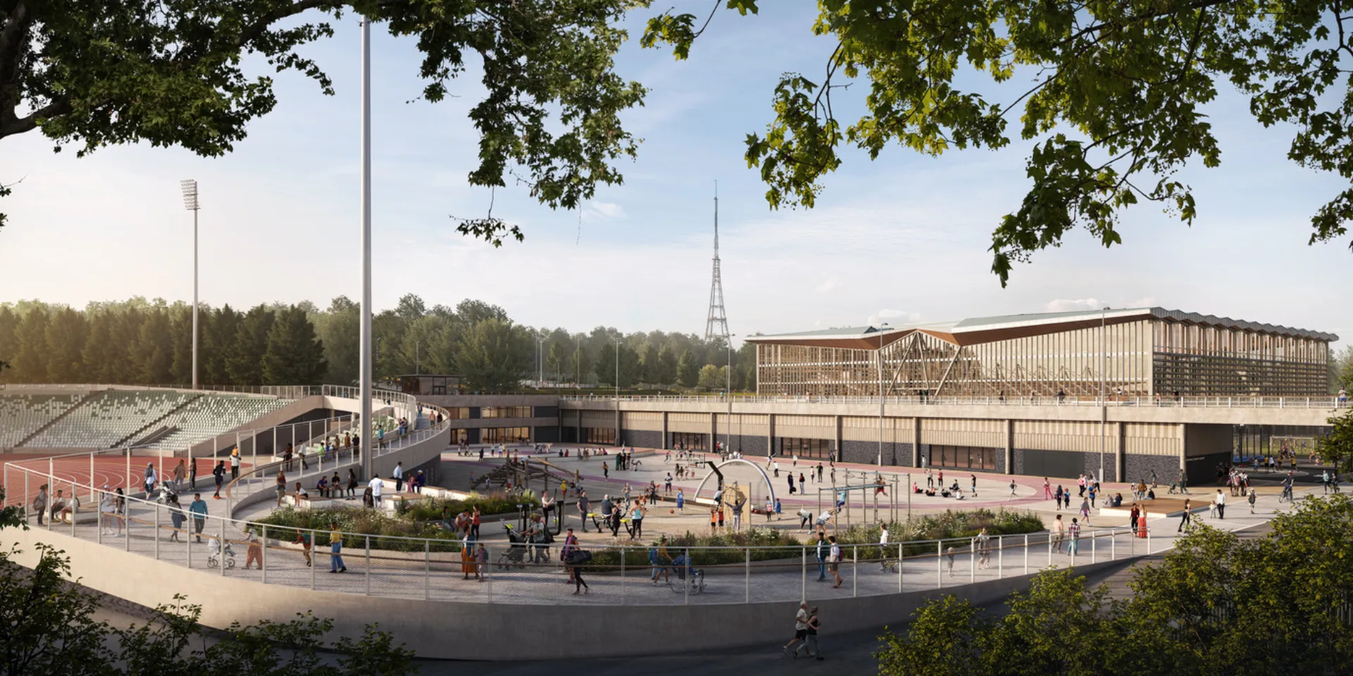 Sports campus plaza with athletics stadium, indoor arena and people using outdoor recreation spaces.