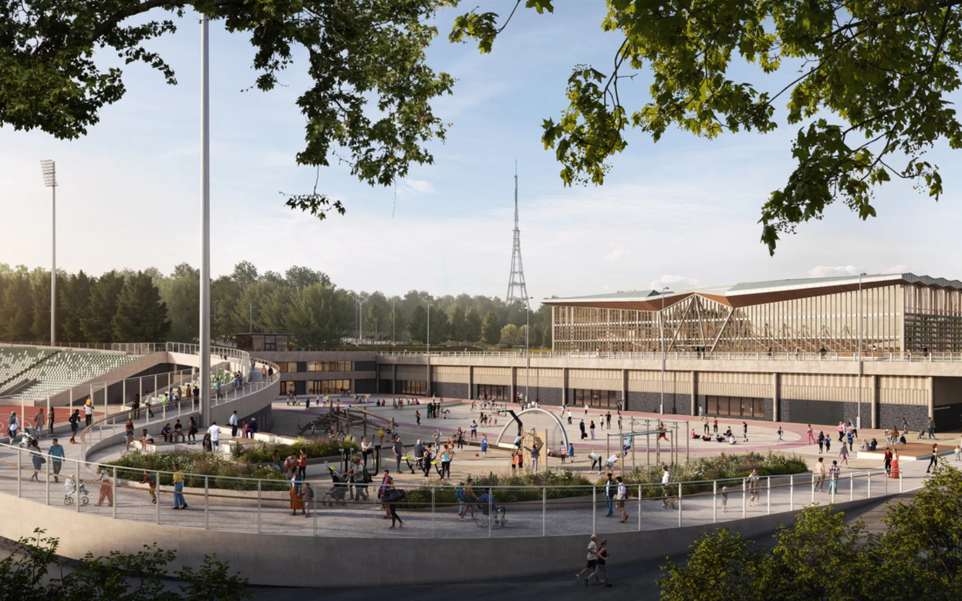 Sports campus plaza with athletics stadium, indoor arena and people using outdoor recreation spaces.