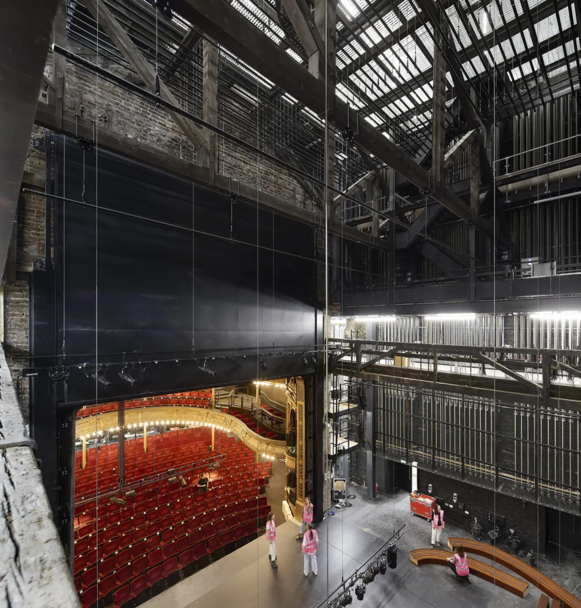 image shot from above showing backstage and flytower and cables used to raise and lower scenes