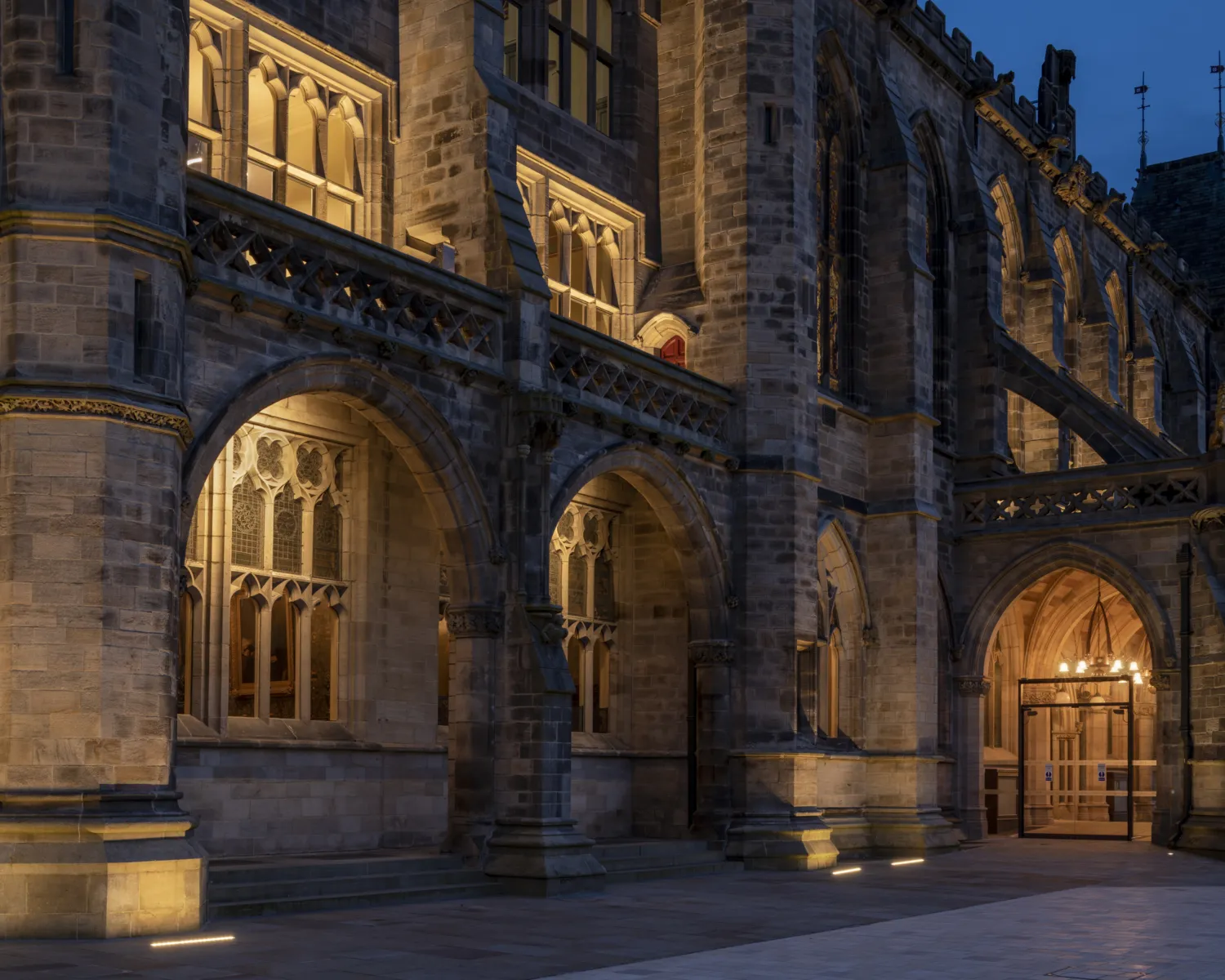 The exterior of the hall lit at night
