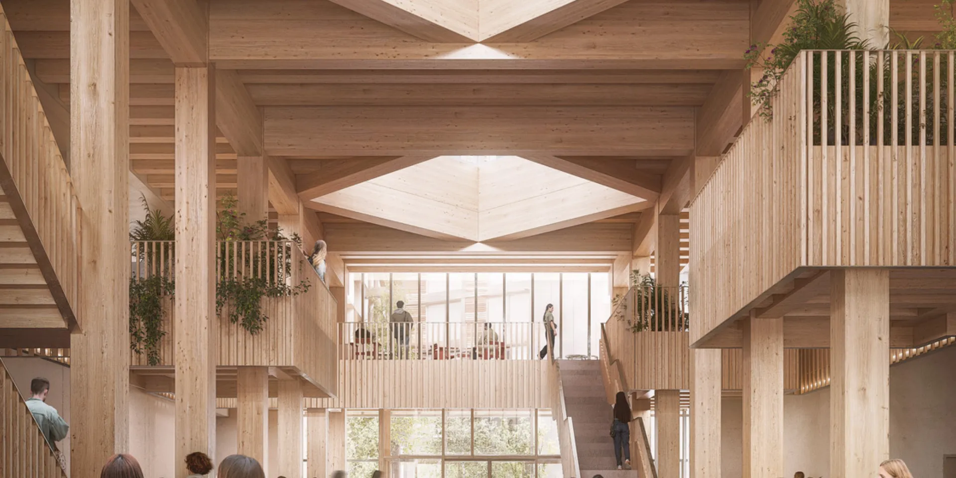 Images shows a large atrium which uses a lot of wood. Light is coming through from a skylight.
