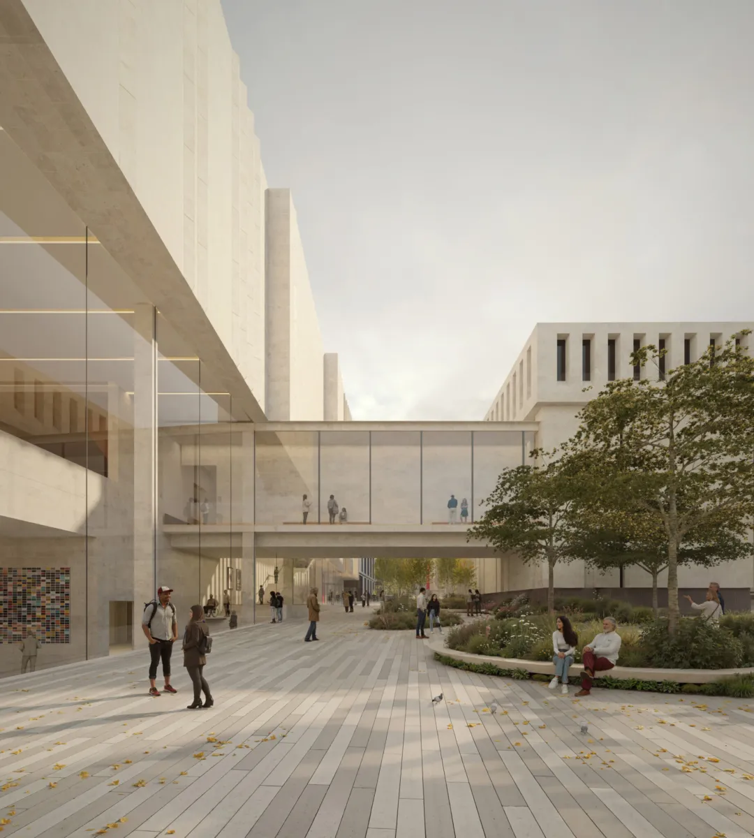 Public courtyard with glass bridge linking new gallery buildings