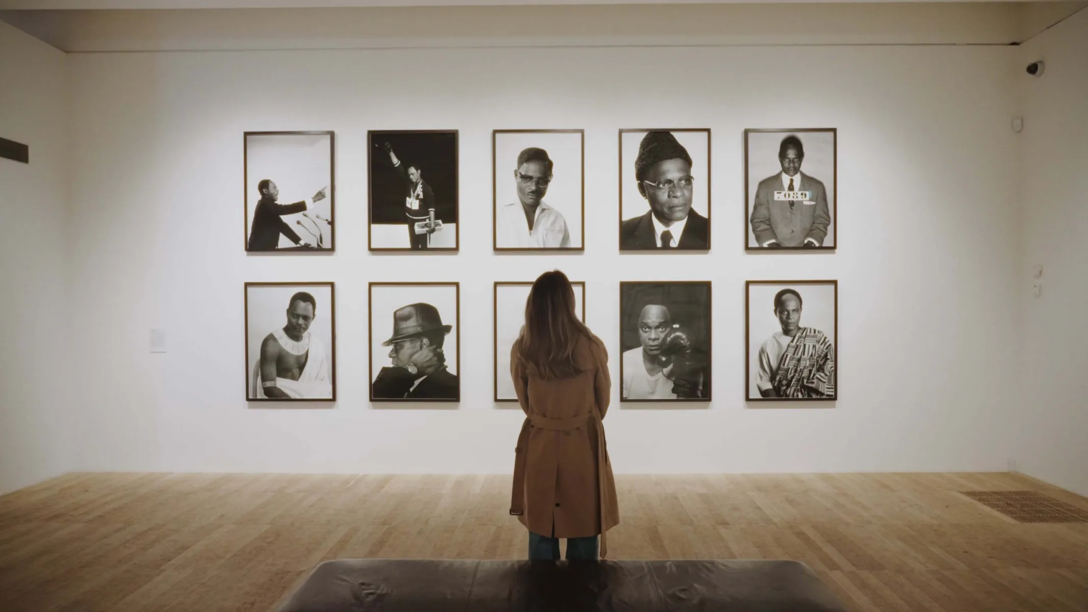 Imogen looking at portraits